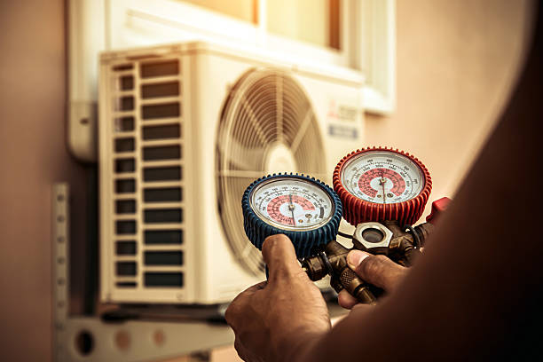 Professional Heat Pump Repair technician working in Creston, IA